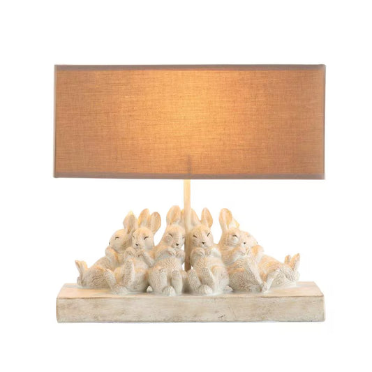 13 In. off White Resin Rabbit Lamp with Linen Shade